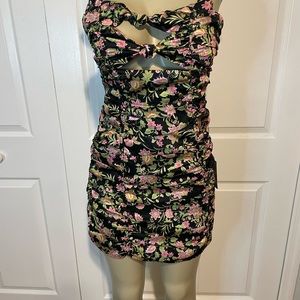NWT NSR Navy Blue flowered Mini dress with some  cleavage exposed size Medium.